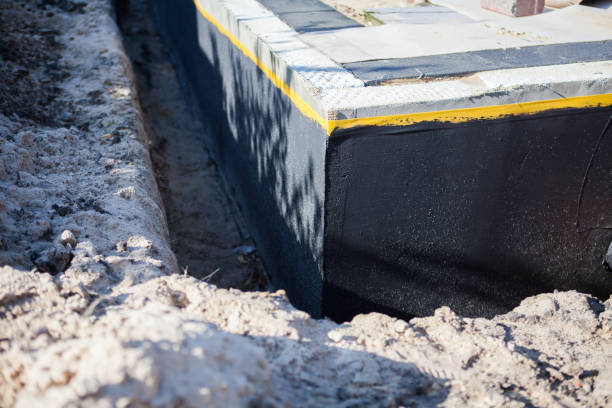 Professional Waterproofing technician working in Beltsville, MD